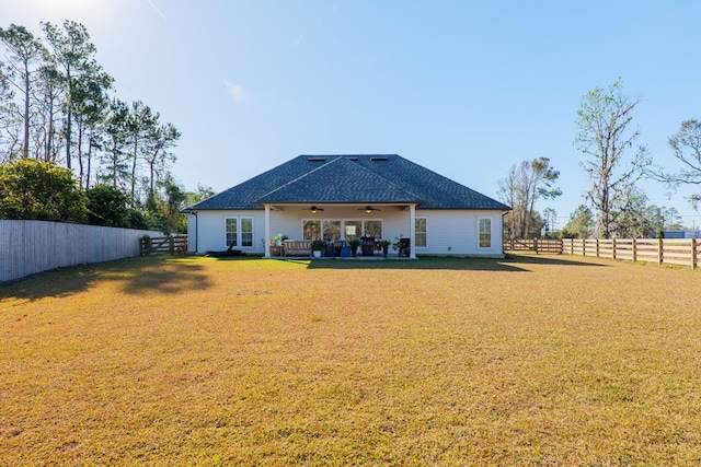 1848 W Marion Ave, Lake Park, GA 31636 - rear view of house featuring ceiling fan, a fenced backyard, a shingled roof, and a patio