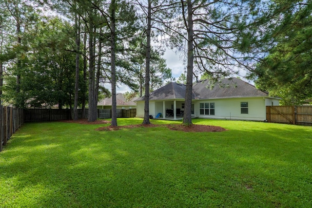 view of yard featuring a fenced backyard