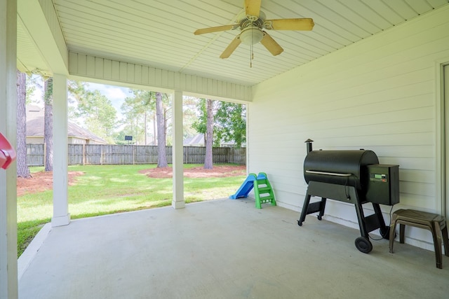 view of patio / terrace featuring a ceiling fan, fence, and a grill