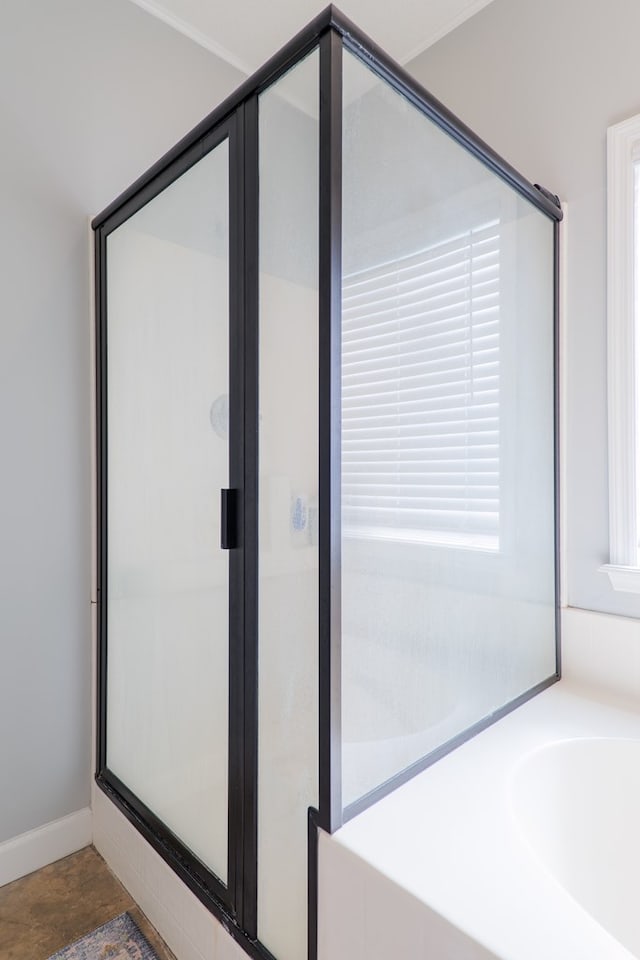 bathroom with a shower stall