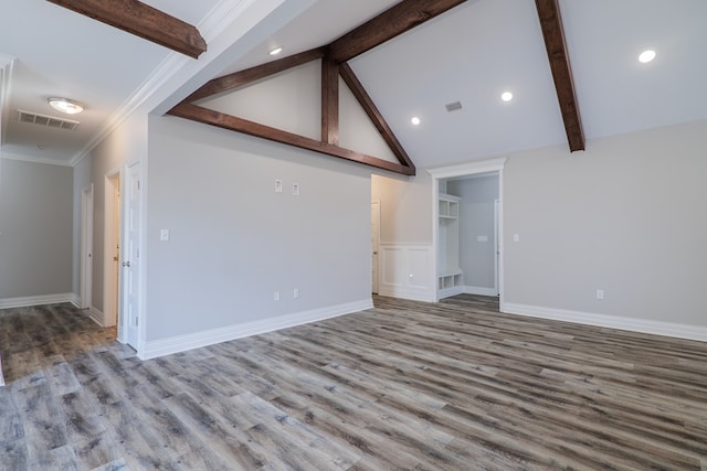 unfurnished living room with hardwood / wood-style floors, high vaulted ceiling, ornamental molding, and beamed ceiling