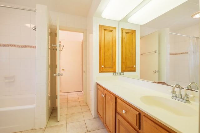 bathroom with shower / bath combo, tile patterned flooring, and vanity