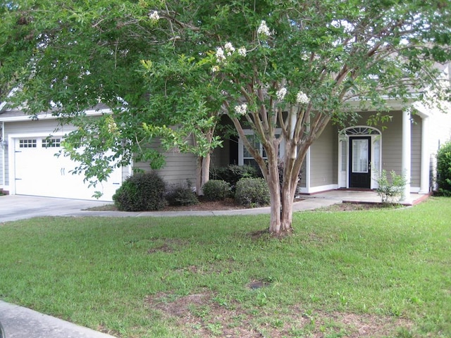 3745 Old Vine Way, Valdosta, GA 31605 - obstructed view of property featuring a front yard, a garage, and driveway