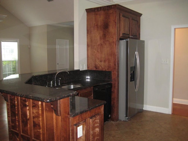 3745 Old Vine Way, Valdosta, GA 31605 - kitchen with stainless steel fridge, a sink, dishwasher, a peninsula, and dark stone countertops