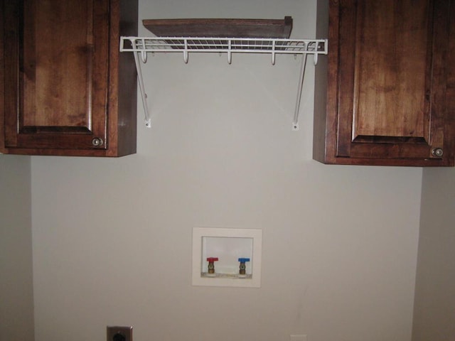 3745 Old Vine Way, Valdosta, GA 31605 - laundry area featuring cabinet space, washer hookup, and hookup for an electric dryer
