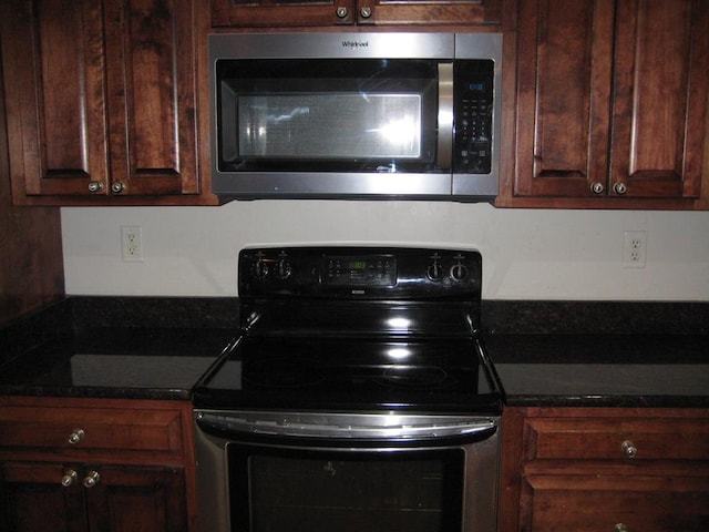 3745 Old Vine Way, Valdosta, GA 31605 - kitchen featuring electric stove, stainless steel microwave, and dark brown cabinets