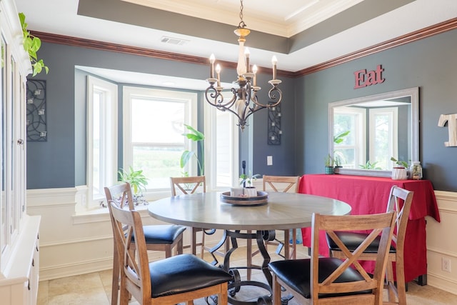 203 Murray Mccranie Rd, Norman Park, GA 31771 - dining space with plenty of natural light, a chandelier, a raised ceiling, and ornamental molding