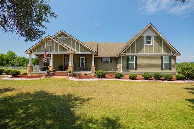 203 Murray Mccranie Rd, Norman Park, GA 31771 - craftsman-style home with board and batten siding, a porch, and a front yard