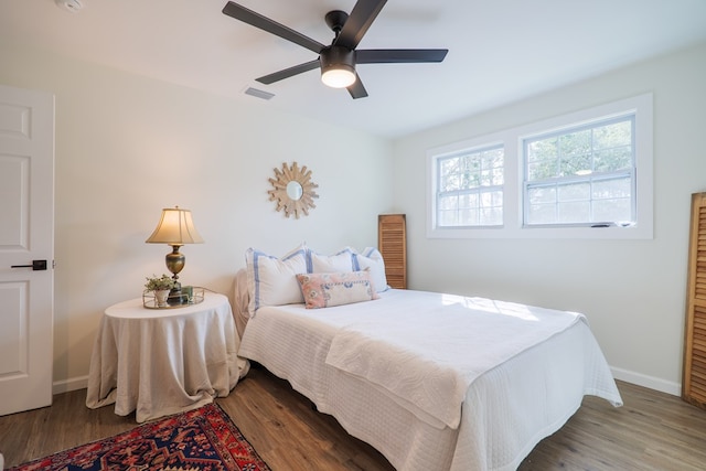 6041 NE Edmundson Rd, Hahira, GA 31632 - bedroom featuring wood finished floors, baseboards, and ceiling fan
