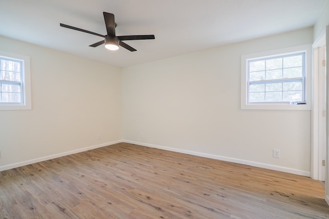 6041 NE Edmundson Rd, Hahira, GA 31632 - unfurnished room with wood finished floors, a ceiling fan, and baseboards