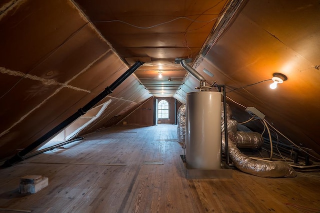 bonus room with vaulted ceiling, hardwood / wood-style floors, and gas water heater