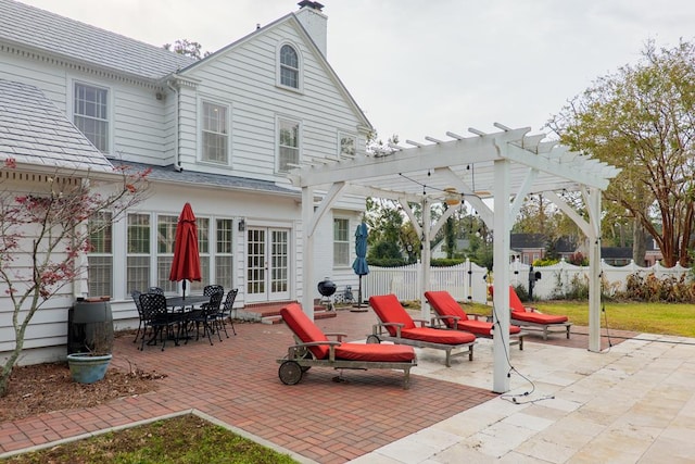 view of patio / terrace with a pergola and french doors