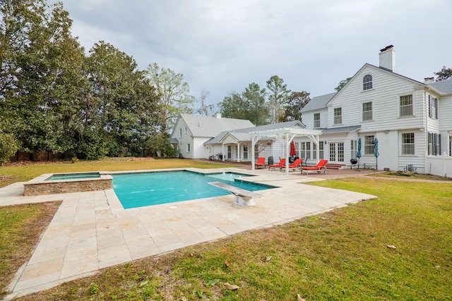 view of pool with a diving board, a pergola, a yard, an in ground hot tub, and a patio area