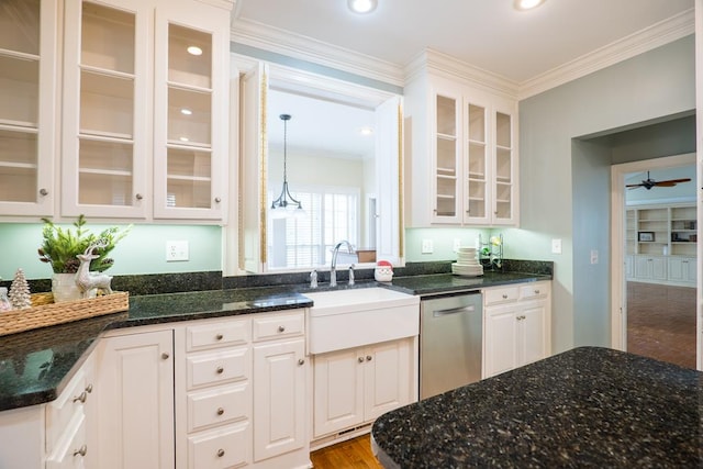 kitchen with white cabinets, ornamental molding, sink, dishwasher, and hanging light fixtures