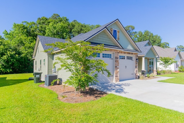 craftsman-style house with a front lawn and central air condition unit