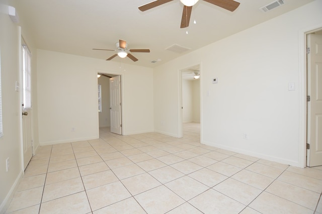 empty room with light tile patterned floors