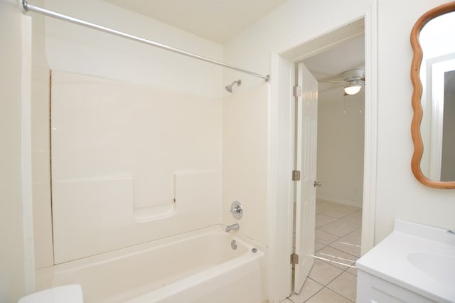 bathroom with tile patterned floors, bathtub / shower combination, and vanity