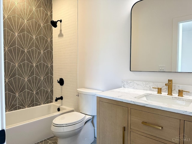 bathroom with toilet, vanity, and shower / bathtub combination