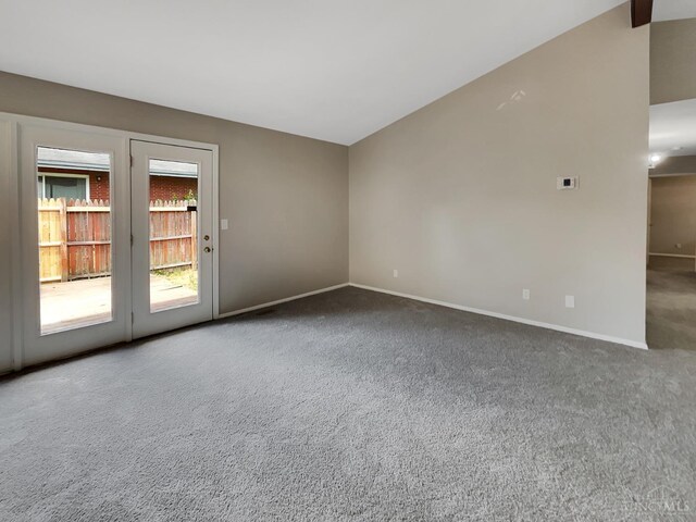 824 Cascade Rd, Forest Park, OH 45240 - carpeted empty room with baseboards and lofted ceiling