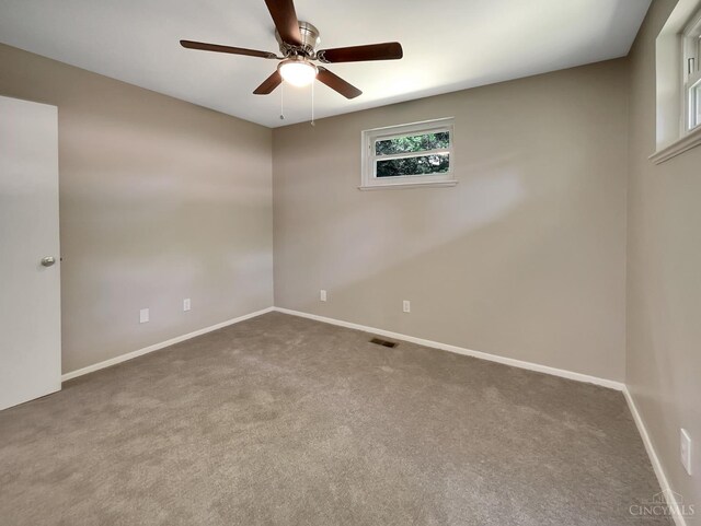 824 Cascade Rd, Forest Park, OH 45240 - carpeted empty room with a ceiling fan and baseboards