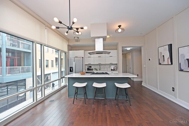 1 Mercer St Unit 204, Cincinnati, OH 45202 - kitchen with decorative backsplash, stainless steel refrigerator with ice dispenser, white cabinetry, and dark wood-style floors