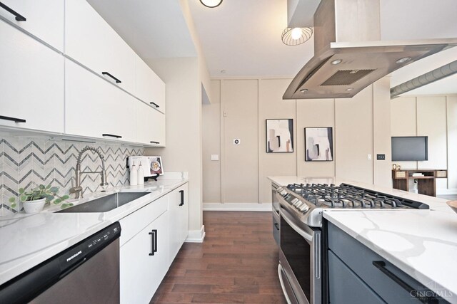1 Mercer St Unit 204, Cincinnati, OH 45202 - kitchen featuring appliances with stainless steel finishes, light stone counters, a sink, dark wood finished floors, and island exhaust hood
