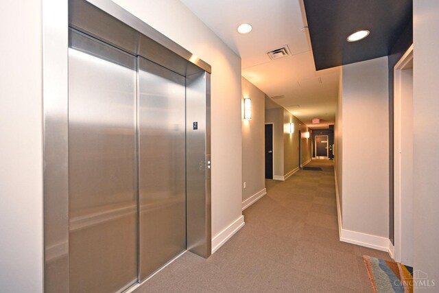 1 Mercer St Unit 204, Cincinnati, OH 45202 - corridor featuring carpet floors, visible vents, baseboards, elevator, and recessed lighting