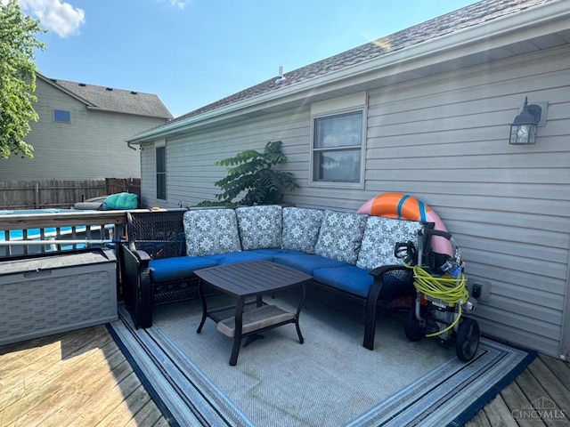 5506 Glen Ct, Carlisle, OH 45005 - deck with an outdoor hangout area and a pool