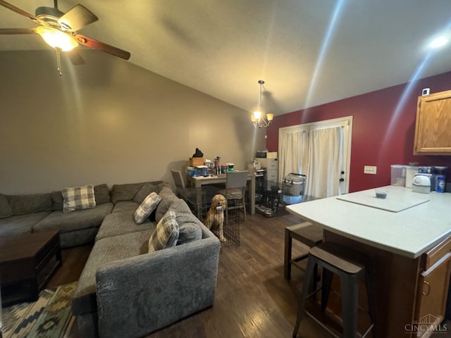 5506 Glen Ct, Carlisle, OH 45005 - living room featuring ceiling fan with notable chandelier, dark hardwood / wood-style floors, and lofted ceiling