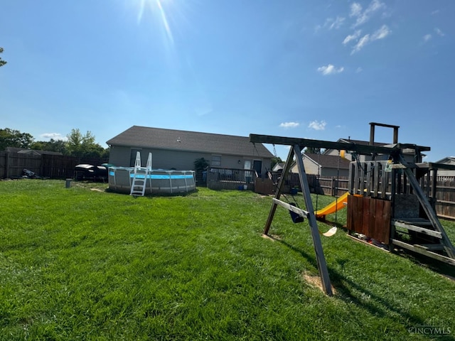 5506 Glen Ct, Carlisle, OH 45005 - exterior space featuring a playground and a fenced in pool