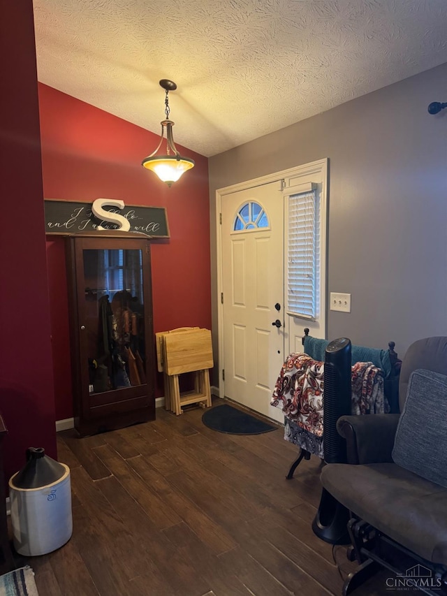 5506 Glen Ct, Carlisle, OH 45005 - foyer with a textured ceiling and dark hardwood / wood-style flooring