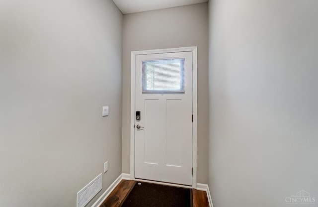 61 Goldfish Ln, Pierce Twp, OH 45102 - doorway to outside with dark wood-style floors and baseboards
