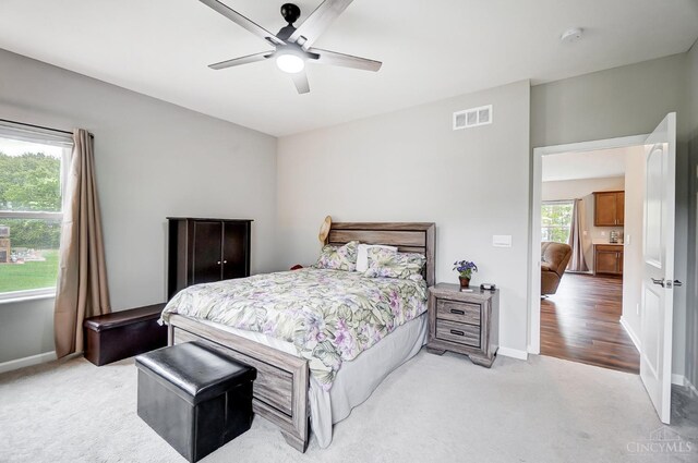 61 Goldfish Ln, Pierce Twp, OH 45102 - bedroom with light colored carpet, baseboards, and ceiling fan