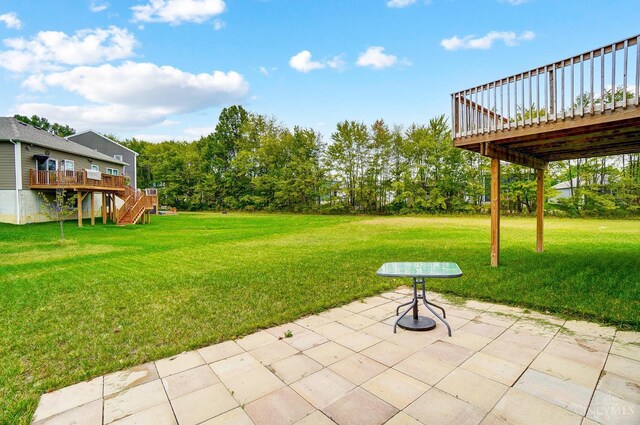 61 Goldfish Ln, Pierce Twp, OH 45102 - view of green lawn with a patio area, a wooden deck, and stairway
