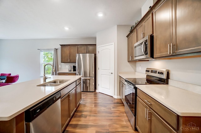 61 Goldfish Ln, Pierce Twp, OH 45102 - kitchen with stainless steel appliances, a sink, dark wood finished floors, light countertops, and recessed lighting