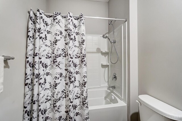 61 Goldfish Ln, Pierce Twp, OH 45102 - bathroom with toilet and shower / bathtub combination with curtain