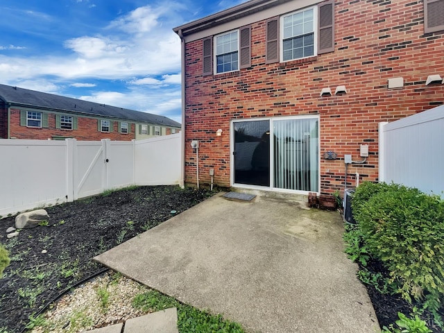 rear view of property with a patio area