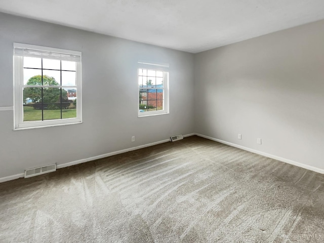 view of carpeted spare room