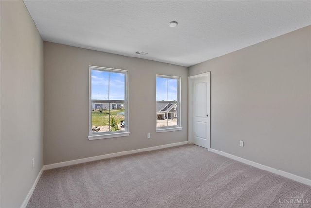 1658 Whitewater Trails Blvd, Harrison, OH 45030 - unfurnished room with baseboards and light colored carpet