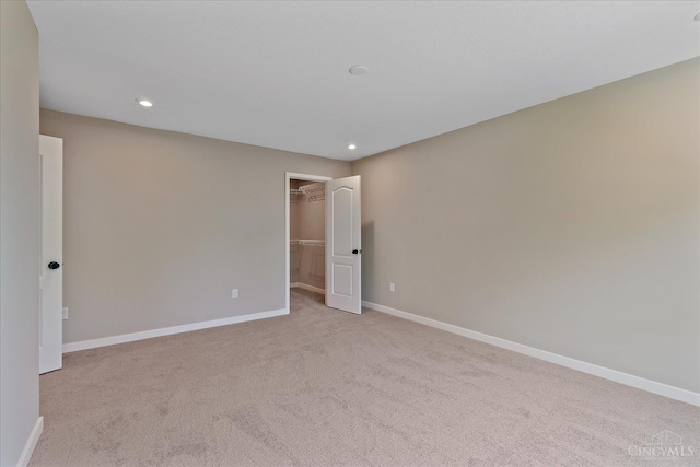 1658 Whitewater Trails Blvd, Harrison, OH 45030 - unfurnished room featuring baseboards, carpet flooring, and recessed lighting
