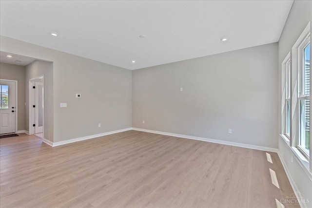1658 Whitewater Trails Blvd, Harrison, OH 45030 - empty room with light wood-type flooring, baseboards, and recessed lighting