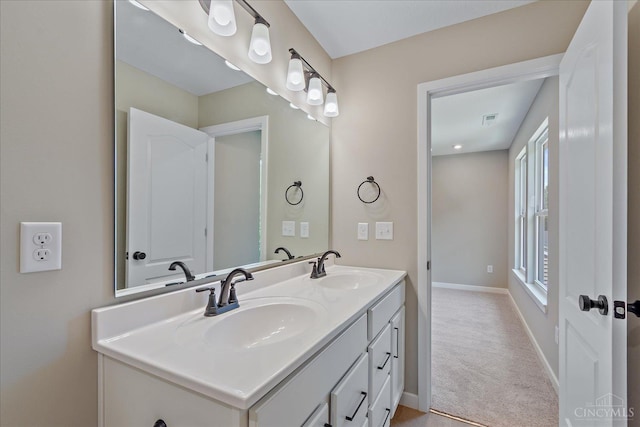 1658 Whitewater Trails Blvd, Harrison, OH 45030 - bathroom with double vanity and baseboards