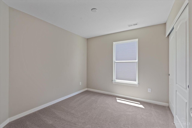 1658 Whitewater Trails Blvd, Harrison, OH 45030 - unfurnished bedroom with carpet floors, baseboards, and a closet
