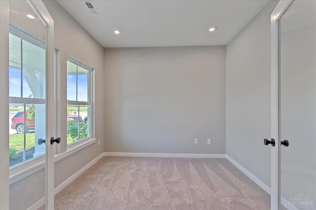 1658 Whitewater Trails Blvd, Harrison, OH 45030 - unfurnished room with french doors, light colored carpet, baseboards, and recessed lighting