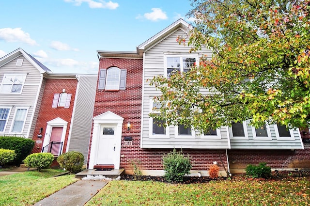 818 William Howard Taft Rd, Cincinnati, OH 45206 - townhome / multi-family property with brick siding and a front lawn