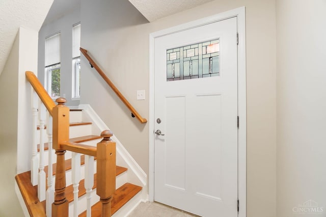 818 William Howard Taft Rd, Cincinnati, OH 45206 - entrance foyer with a textured ceiling and stairs