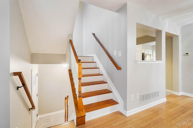 818 William Howard Taft Rd, Cincinnati, OH 45206 - stairway with wood finished floors and baseboards