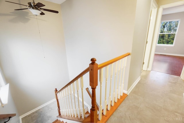 818 William Howard Taft Rd, Cincinnati, OH 45206 - staircase featuring a ceiling fan and baseboards