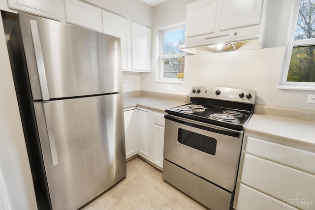 818 William Howard Taft Rd, Cincinnati, OH 45206 - kitchen with stainless steel appliances, under cabinet range hood, white cabinets, and light countertops