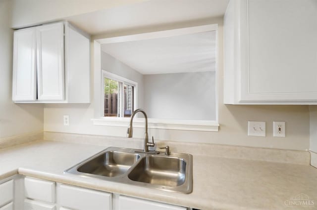818 William Howard Taft Rd, Cincinnati, OH 45206 - kitchen featuring white cabinetry and light countertops